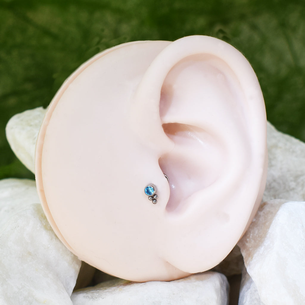 PIERCING LABRET BRILLO CELESTE REDONDO ORNAMENTOS