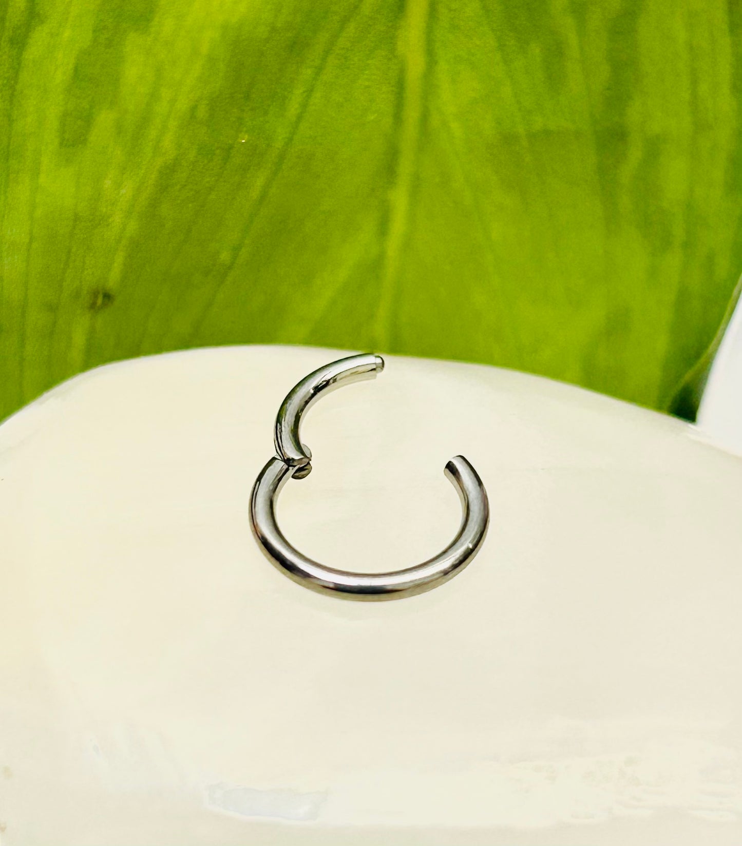 Piercing aro clicker