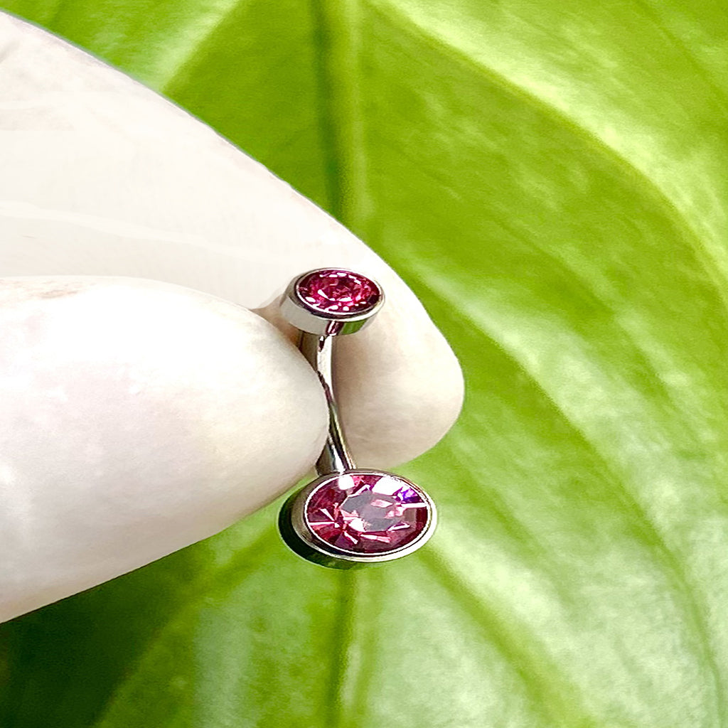Piercing para ombligo con circón fucsia