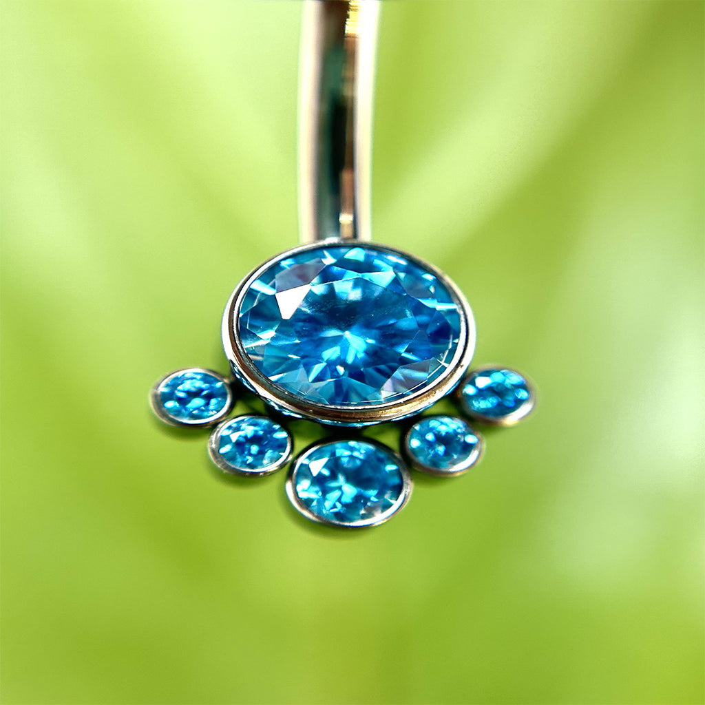 Piercing para ombligo con circones azules