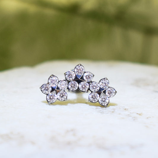 PIERCING LABRET CLUSTER TRES FLORES
