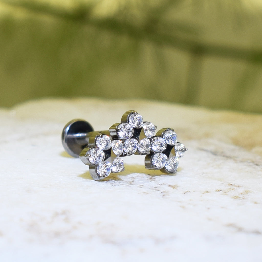 PIERCING LABRET CLUSTER TRES FLORES