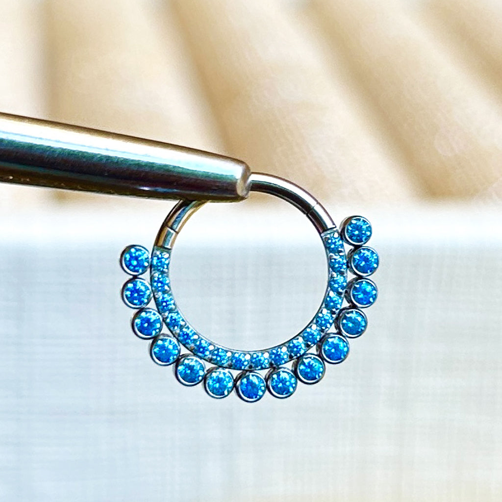 PIERCING ARO DOBLE BRILLOS AZULES