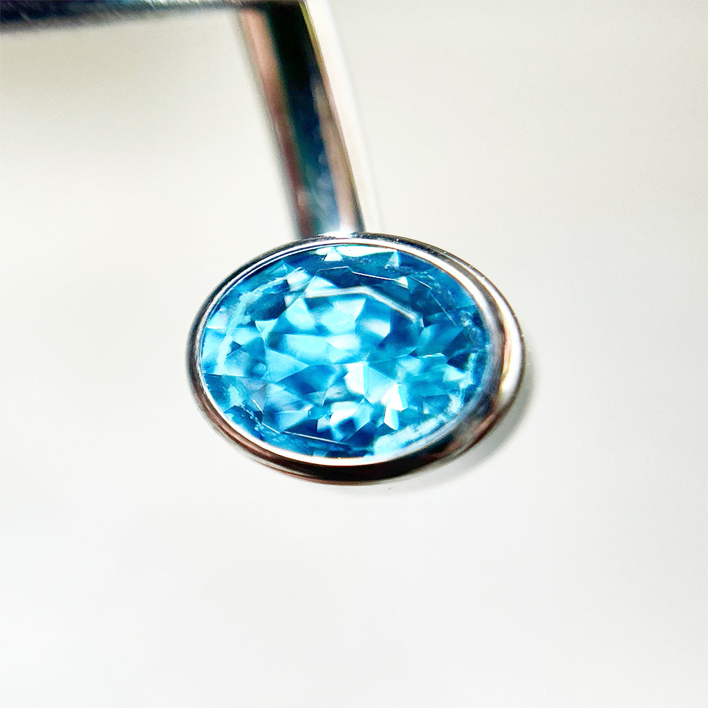 Piercing para ombligo con circón azul