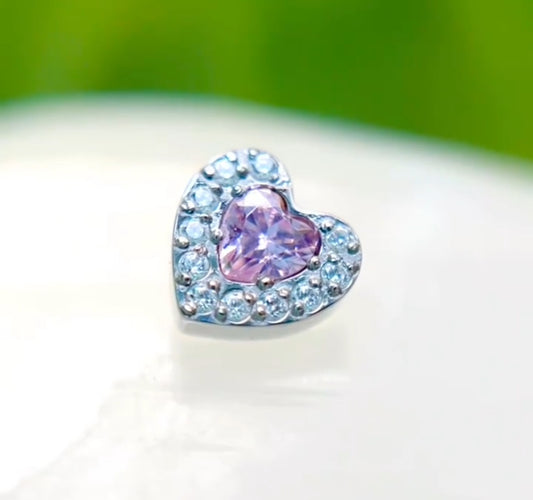 Piercing corazón rosa y blanco